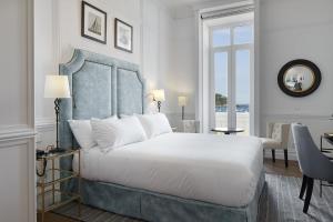 Posteľ alebo postele v izbe v ubytovaní Hotel Boutique Villa Favorita + 37 fotografií