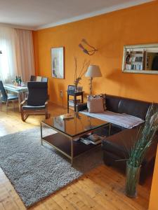 a living room with a couch and a table at Vienna Center,private zimmer, ! in Vienna