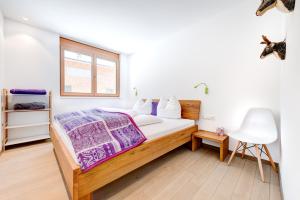 Postel nebo postele na pokoji v ubytování Appartement Valbona Blick by A-Appartments