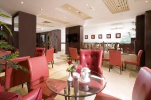 Ein Sitzbereich in der Unterkunft Golden Park Hotel Cairo, Heliopolis