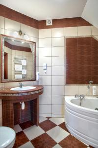Koupelna v ubytování Hotel - Dworek Tryumf