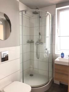 Kúpeľňa v ubytovaní Apartament 65m2 z balkonem blisko jeziora + 8 fotografií