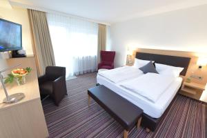 Postel nebo postele na pokoji v ubytování Hotel Krone + 37 fotografií