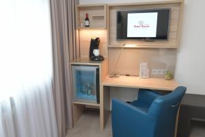 TV a/nebo společenská místnost v ubytování Hotel Krone