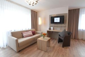 TV a/nebo společenská místnost v ubytování Hotel Krone