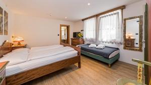 Voodi või voodid majutusasutuse Hotel Brunella toas