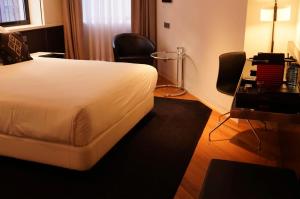 Postel nebo postele na pokoji v ubytování Hotel Inffinit