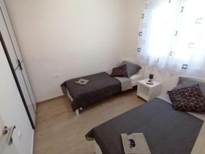 מיטה או מיטות בחדר ב-Apartment Antorena