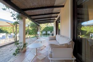 Балкон или терраса в Porto Giunco Residence