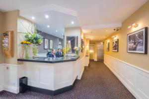 Fuajee või vastuvõtt majutusasutuses Collingham Serviced Apartments