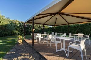 Фотография из галереи Porto Giunco Residence в Вилласимиусе
