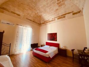 Postel nebo postele na pokoji v ubytování B&B Porta Grande