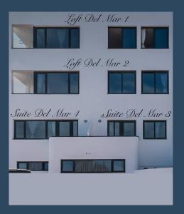 a tall white building with the words oh wait what at Loft del Mar 2 Jandia in Playa Jandia