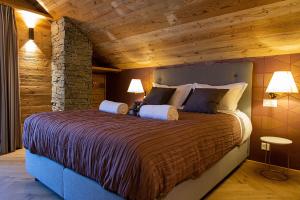 Katil atau katil-katil dalam bilik di Le Vieux Chalet