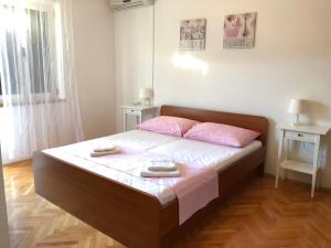 Ein Bett oder Betten in einem Zimmer der Unterkunft Apartment DAZ