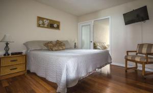 Postel nebo postele na pokoji v ubytování Smyrna Beach Club A603 by Ocean Properties