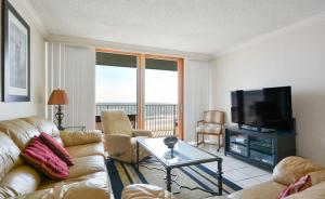 TV a/nebo společenská místnost v ubytování Smyrna Beach Club A603 by Ocean Properties