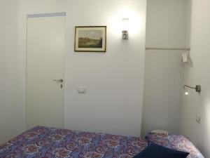 A bed or beds in a room at Casa GiGio 011030-LT-0223