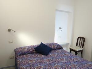 A bed or beds in a room at Casa GiGio 011030-LT-0223