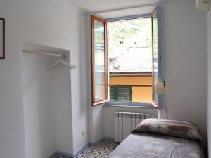 A bed or beds in a room at Casa GiGio 011030-LT-0223