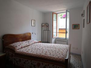 A bed or beds in a room at Casa GiGio 011030-LT-0223