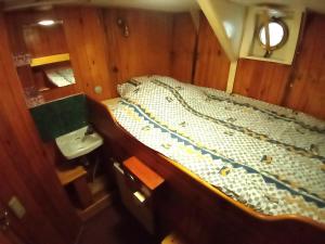 Кровать или кровати в номере Segelfartyget Libelle