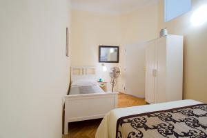 Ein Bett oder Betten in einem Zimmer der Unterkunft City Center Apartment Legerova