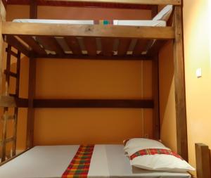 Postel nebo postele na pokoji v ubytování Martinique hostel