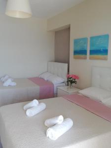 Postel nebo postele na pokoji v ubytování BLUE VIEW Apartments