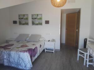 Posteľ alebo postele v izbe v ubytovaní Hotel Estrella del Mar
