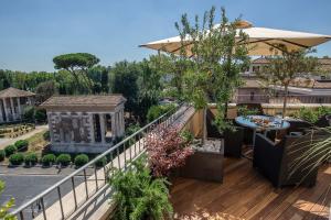 A balcony or terrace at 47 Boutique Hotel