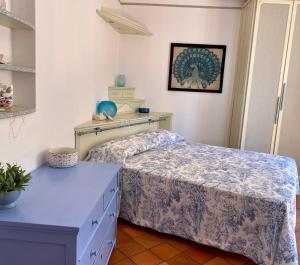 A bed or beds in a room at Villa Soprana by Agenzia SolturElba