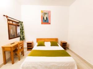 Letto o letti in una camera di Tuzco Lodge