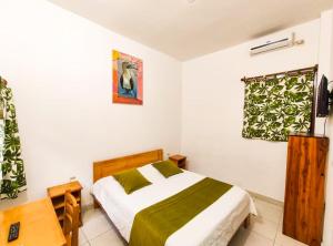 Letto o letti in una camera di Tuzco Lodge