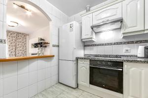 Kuchyň nebo kuchyňský kout v ubytování Apartment with private patio