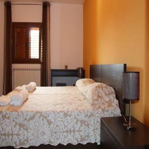 Katil atau katil-katil dalam bilik di Casa das Argolas