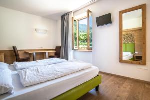 Posteľ alebo postele v izbe v ubytovaní Agriturismo Al Maniero