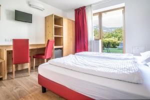 Posteľ alebo postele v izbe v ubytovaní Agriturismo Al Maniero