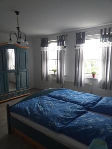 Ένα ή περισσότερα κρεβάτια σε δωμάτιο στο Haus Friede-Rike