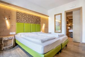 Posteľ alebo postele v izbe v ubytovaní Agriturismo Al Maniero