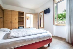 Posteľ alebo postele v izbe v ubytovaní Agriturismo Al Maniero