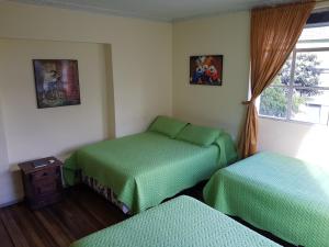 Postel nebo postele na pokoji v ubytování Petite Maison