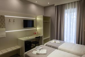 A bed or beds in a room at HOLYGOLD Suite ****