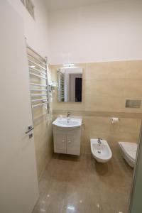 A bathroom at HOLYGOLD Suite ****
