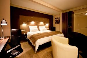 Cama o camas de una habitación en Raadhuis Dinther Suites