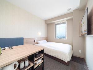 TV a/nebo společenská místnost v ubytování Super Hotel Iyo Saijo