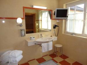 Kupatilo u objektu Business-Hotel Stockinger