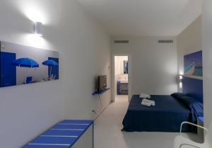 Ένα ή περισσότερα κρεβάτια σε δωμάτιο στο Map Enjoy Rooms