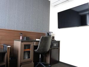 TV a/nebo společenská místnost v ubytování Hotel Abest Grande Takatsuki