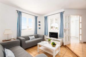 Posezení v ubytování Chalet en Calan Forcat